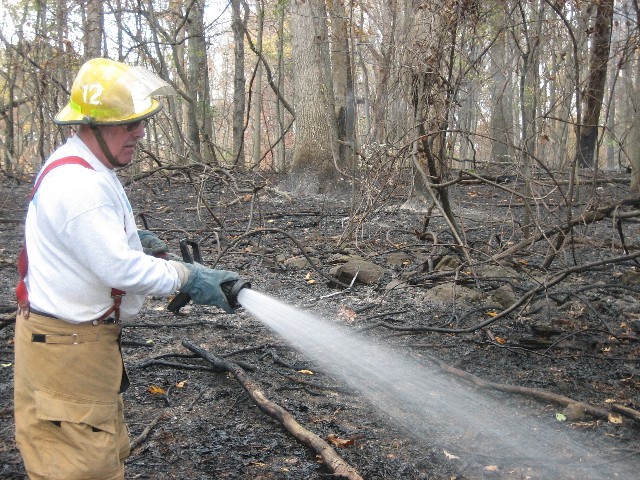 Firefighter Dave Hoff working the hoseline